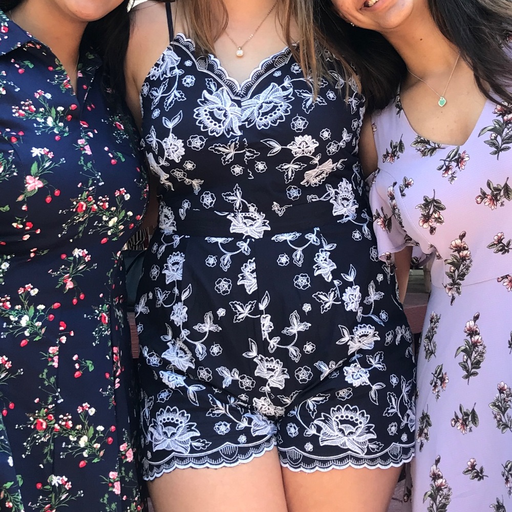 Navy and white embroidered romper